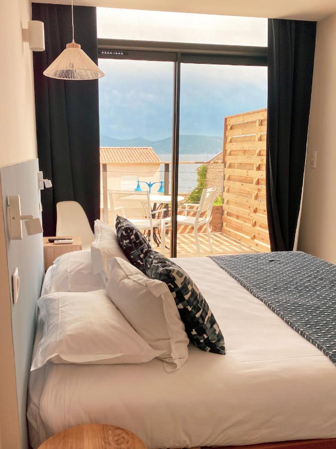 Auberge Kalliste - Eco Label Porto Pollo Bagian luar foto