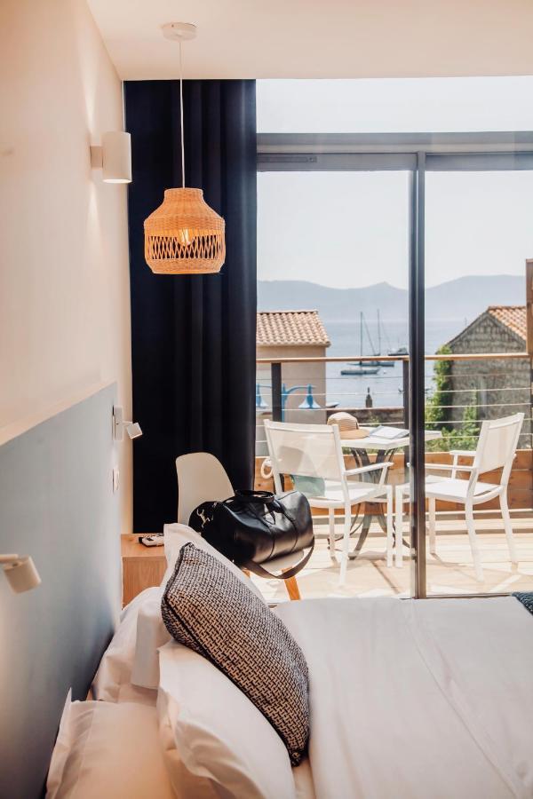 Auberge Kalliste - Eco Label Porto Pollo Bagian luar foto