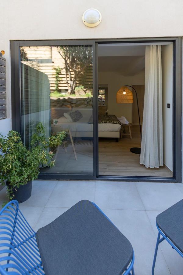 Auberge Kalliste - Eco Label Porto Pollo Bagian luar foto